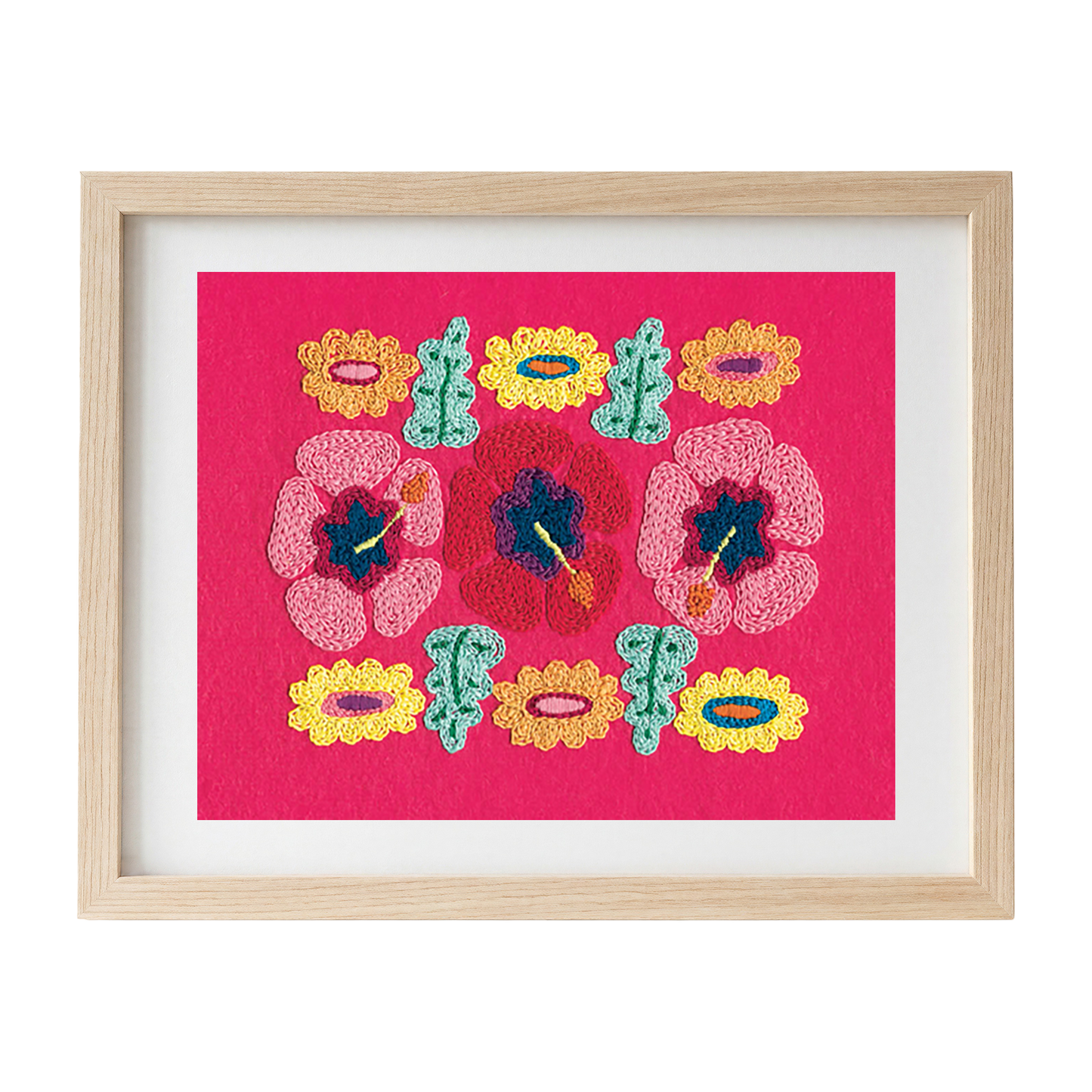 Framed embroidered artwork with colourful hibiscus on a pink felt background