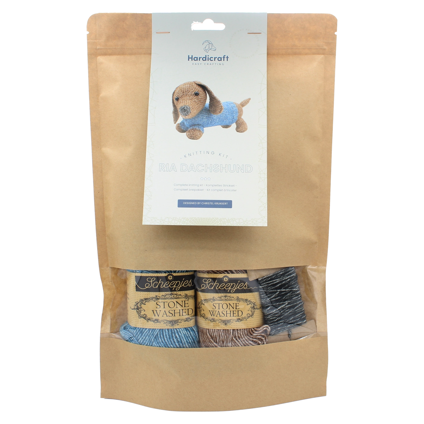 Kraft paper packaging with a label and window revealing blue, brown and black coloured yarn on a white background
