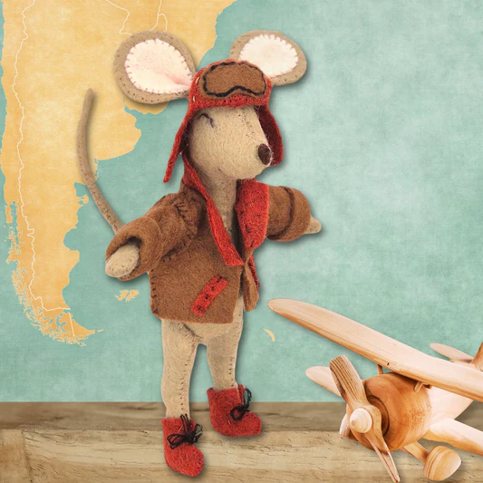 Stuffed toy mouse in aviator costume with wooden aeroplane on a textured background