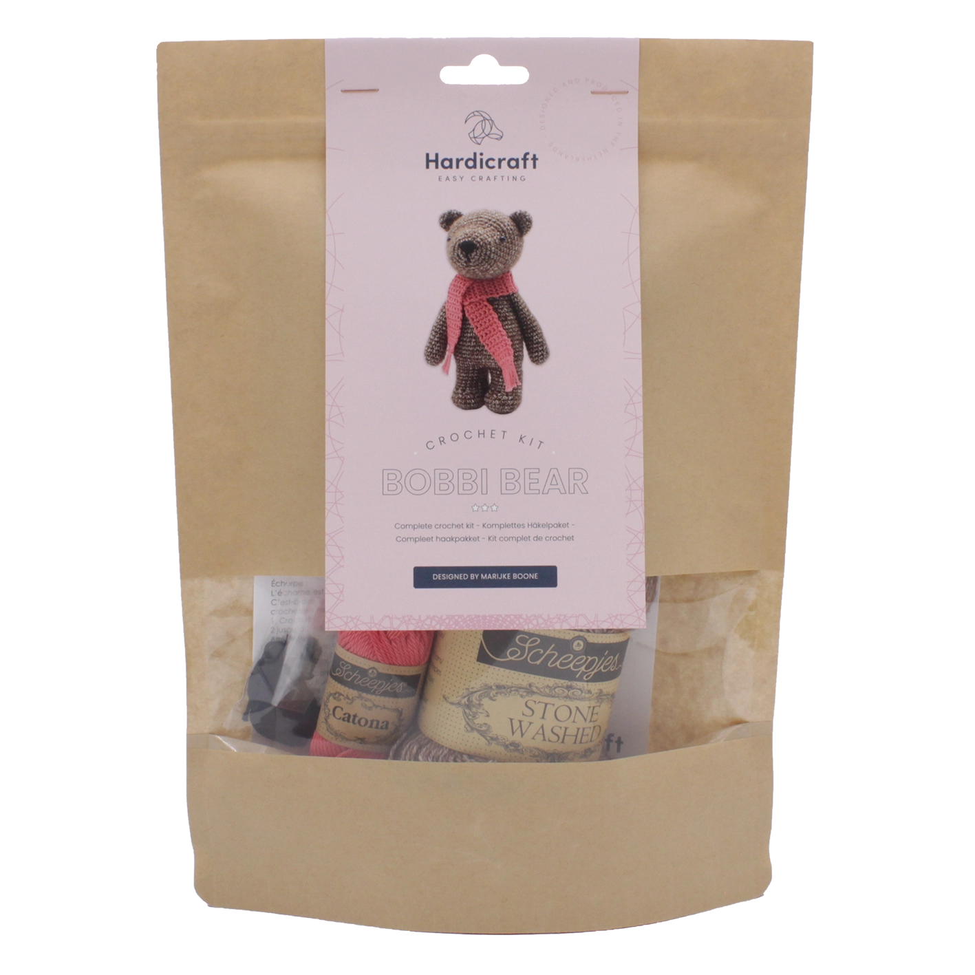 Kraft paper packaging with a label and window revealing black, red and brown coloured yarn on a white background