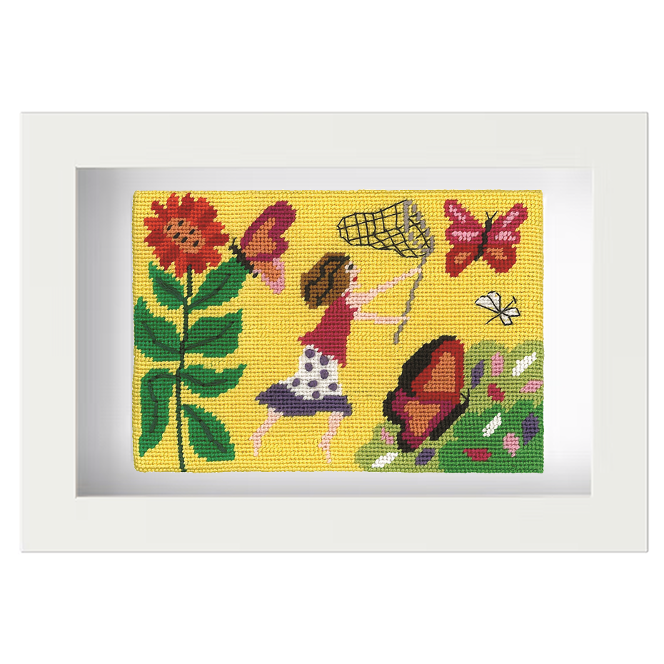 Needlepoint postcard of a woman running in a colourful garden with a butterfly net, on a yellow background, framed in white