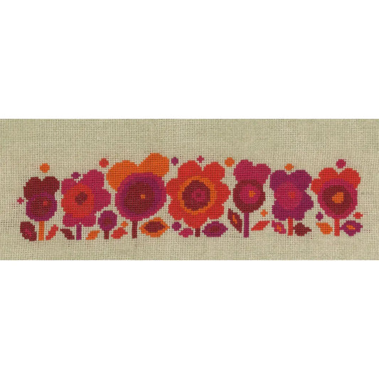 Retro 1970s-style cross stitch flowers in red, orange, and pink on natural coloured counted linen
