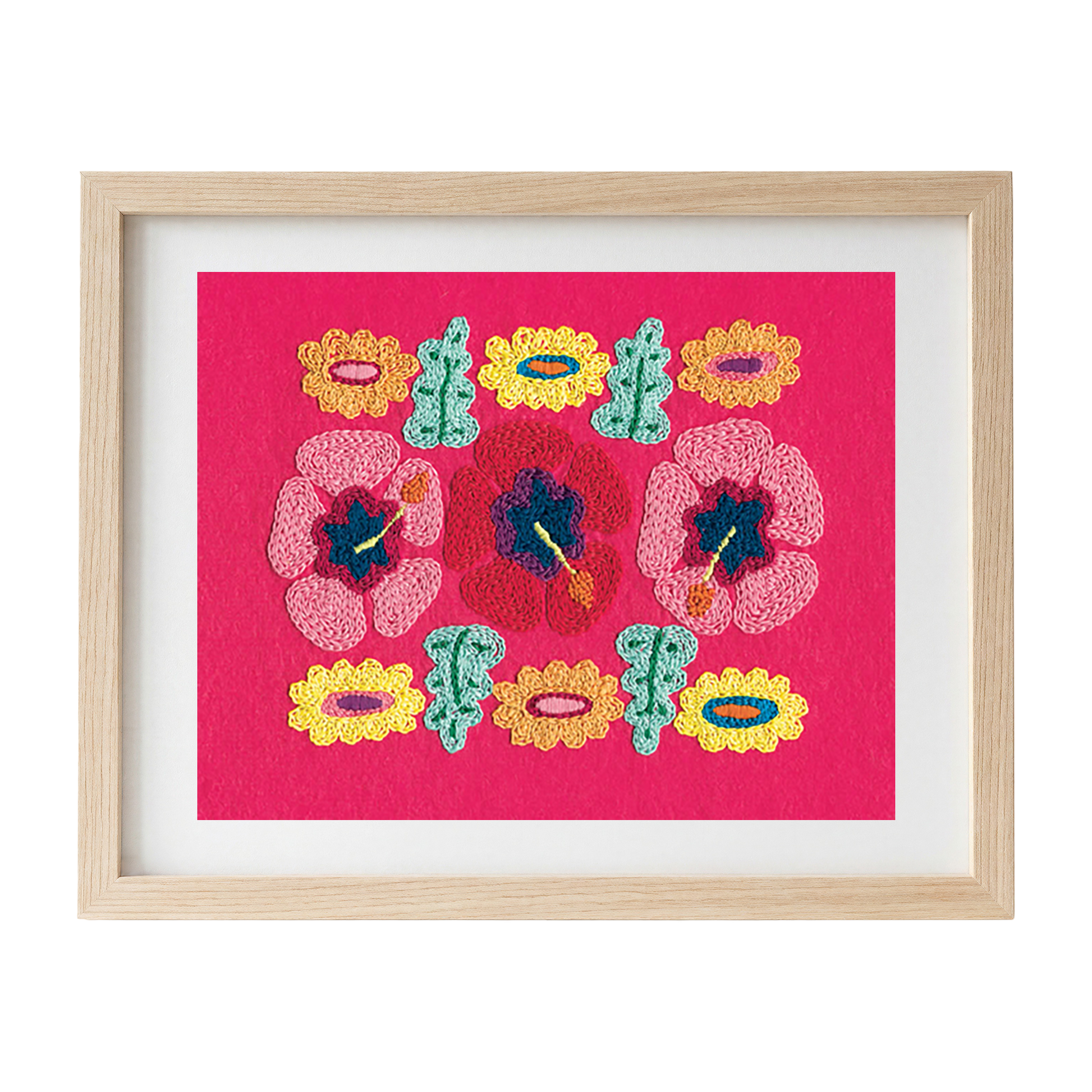 Framed embroidered artwork with colourful hibiscus on a pink felt background