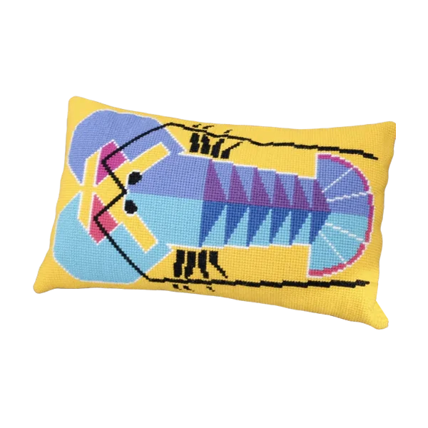Cross stitch cushion featuring a bold lobster design in yellow, blue and purple