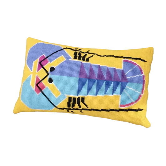 Cross stitch cushion featuring a bold lobster design in yellow, blue and purple