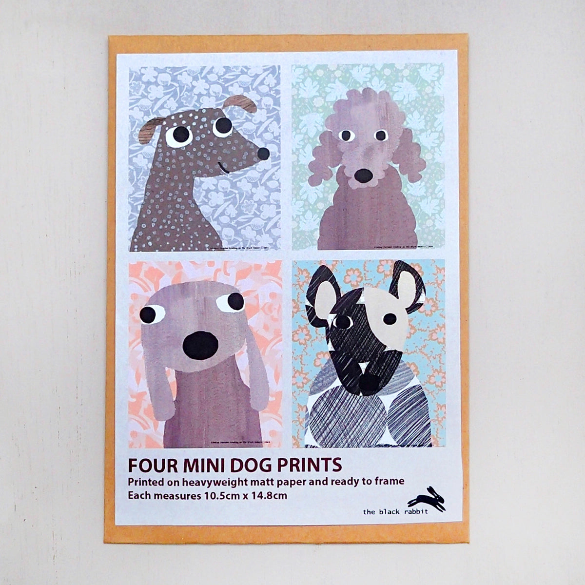 Four mini dog prints kraft packaging with illustrations of contents