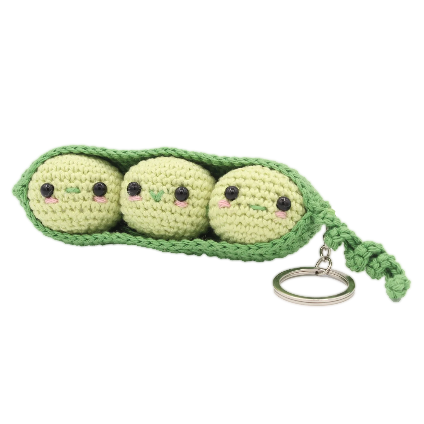 Crocheted keychain or bag charm featuring three peas in a pod in two shades of green on a white background