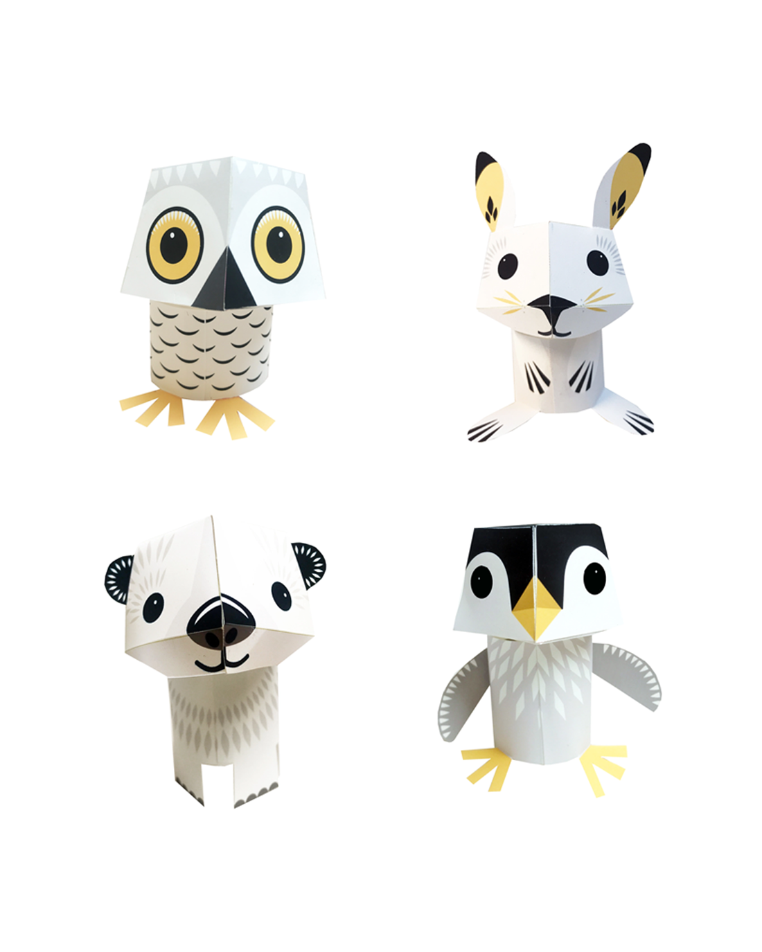 A set of four 3D paper crafts featuring a snow owl, polar bear, baby penguin, and arctic hare, designed for children to cut fold and create